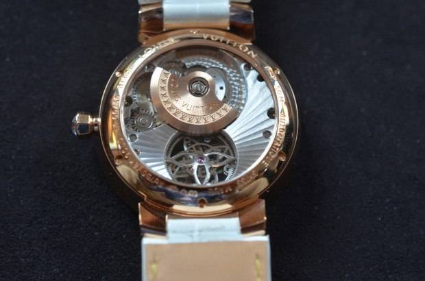 The micro rotor of the Tambour Monogram Tourbillon is placed where it cannot block the view of the tourbillon cage.