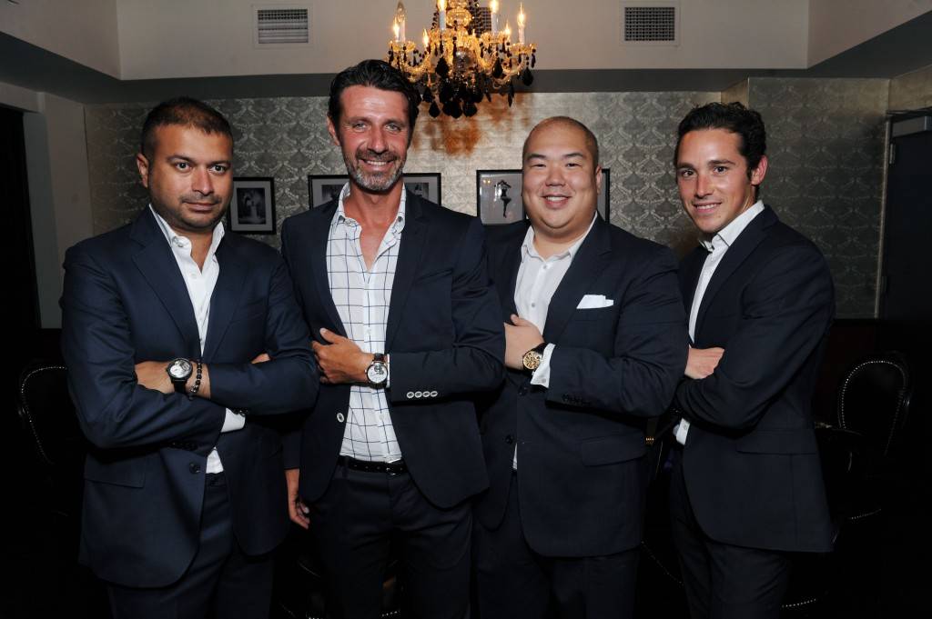NEW YORK, NY - AUGUST 28: Kamal Hotchandani, Patrick Mouratoglou, Paul Earhardt and Fabien Paget attend the Haute Time dinner to celebrate Patrick Mouratoglou as their newest contributor at STK on August 28, 2015 in New York City. (Photo by Craig Barritt/Getty Images for Haute Living)