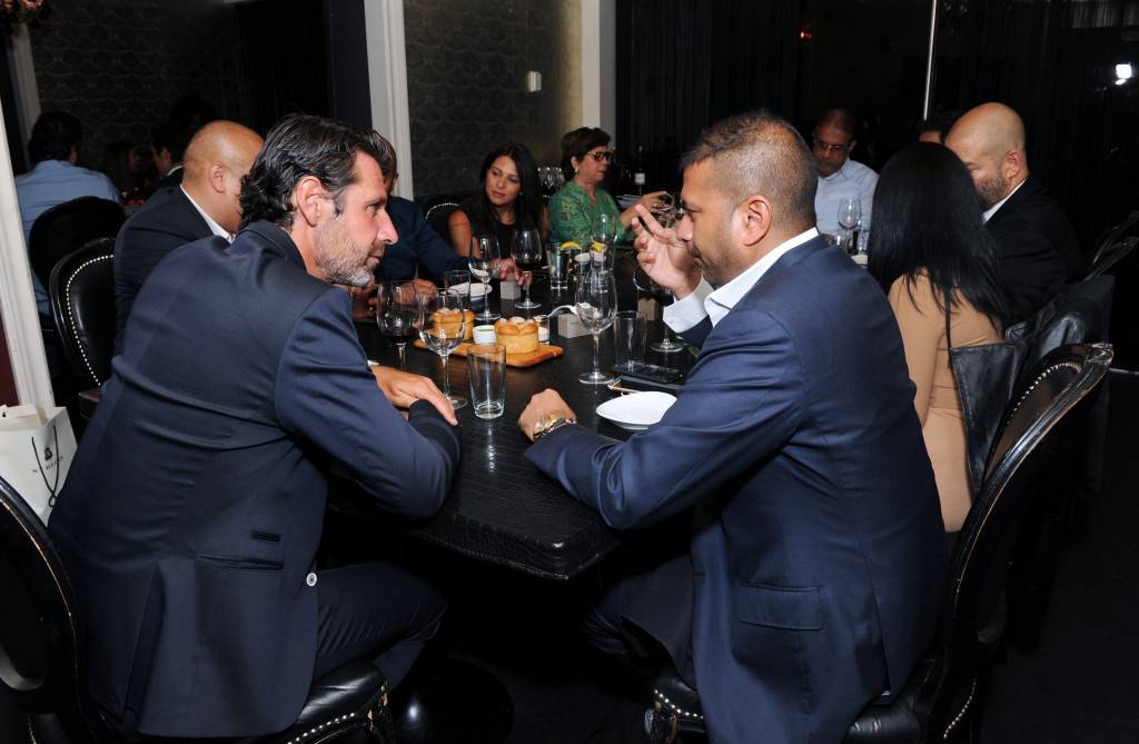 NEW YORK, NY - AUGUST 28: Patrick Mouratoglou and Kamal Hotchandani attend the Haute Time dinner to celebrate Patrick Mouratoglou as their newest contributor at STK on August 28, 2015 in New York City. (Photo by Craig Barritt/Getty Images for Haute Living)