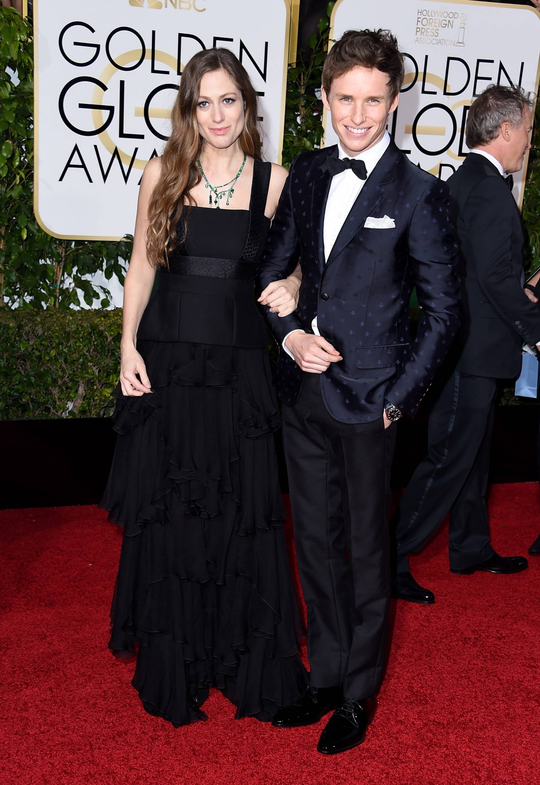 Actor Eddie Redmayne (R) and Hannah Bagshawe attend the 73rd Annual Golden Globe Awards. (Photo by Steve Granitz/WireImage)