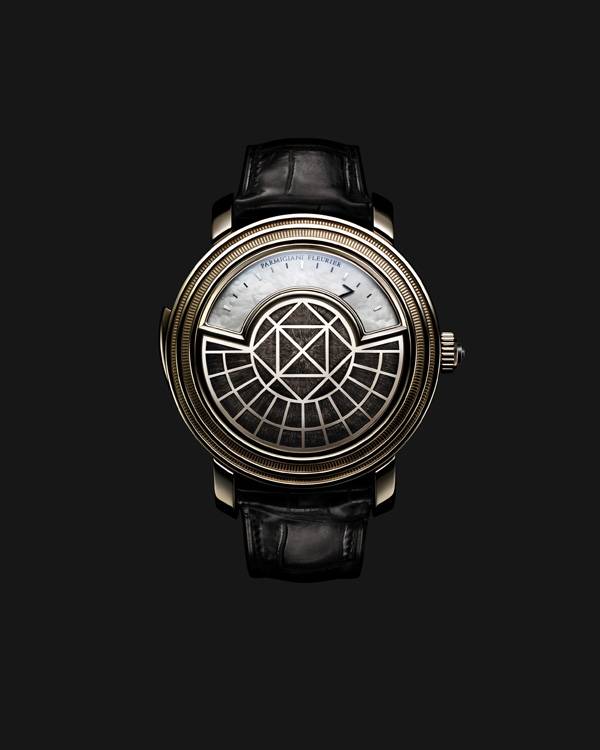 MAGIC HANDS: THE PARMIGIANI FLEURIER TORIC OVAL WATCH WITH TELESCOPING HANDS