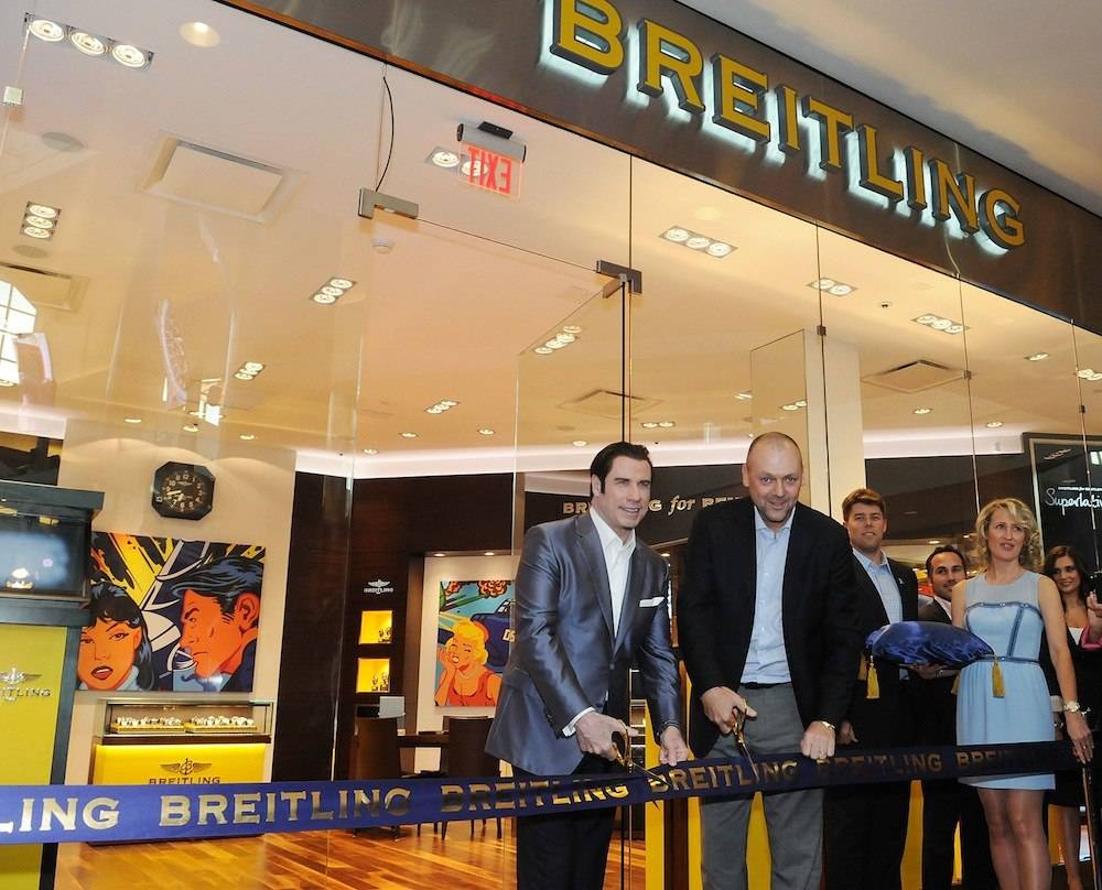 John Travolta Helps Breitling Open New Boutique in Orlando
